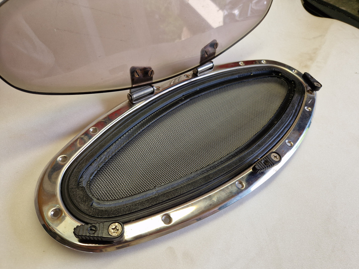 Zanzariere  per oblò BOMAR 140x410 mm Ellittiche REGAL/MANO MARINE